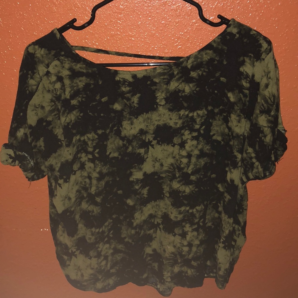 Green and black blouse.